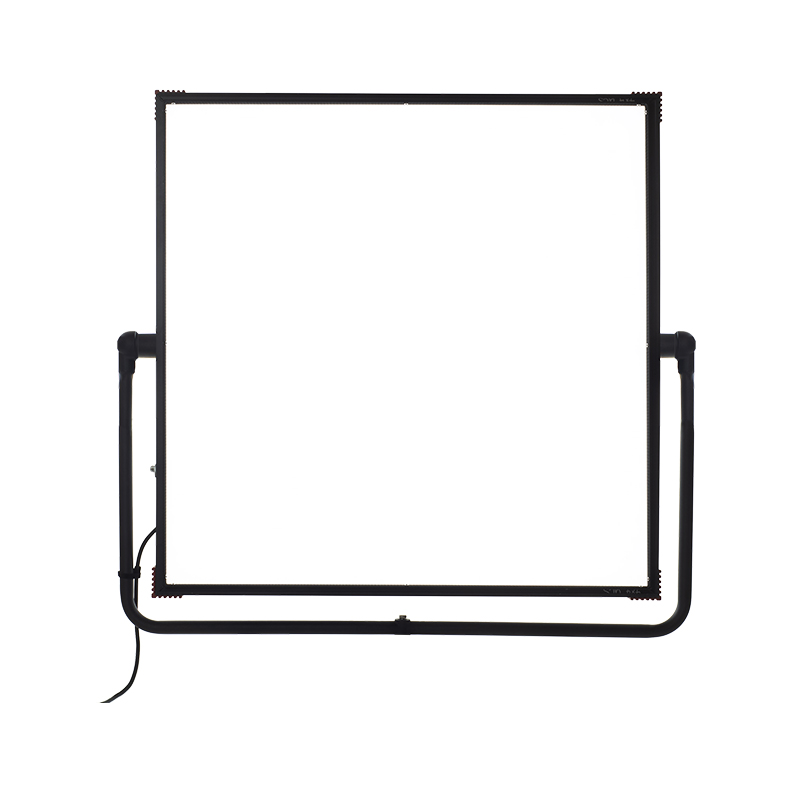 How does the low-heat design of studio lights improve comfort and safety during extended shoots?